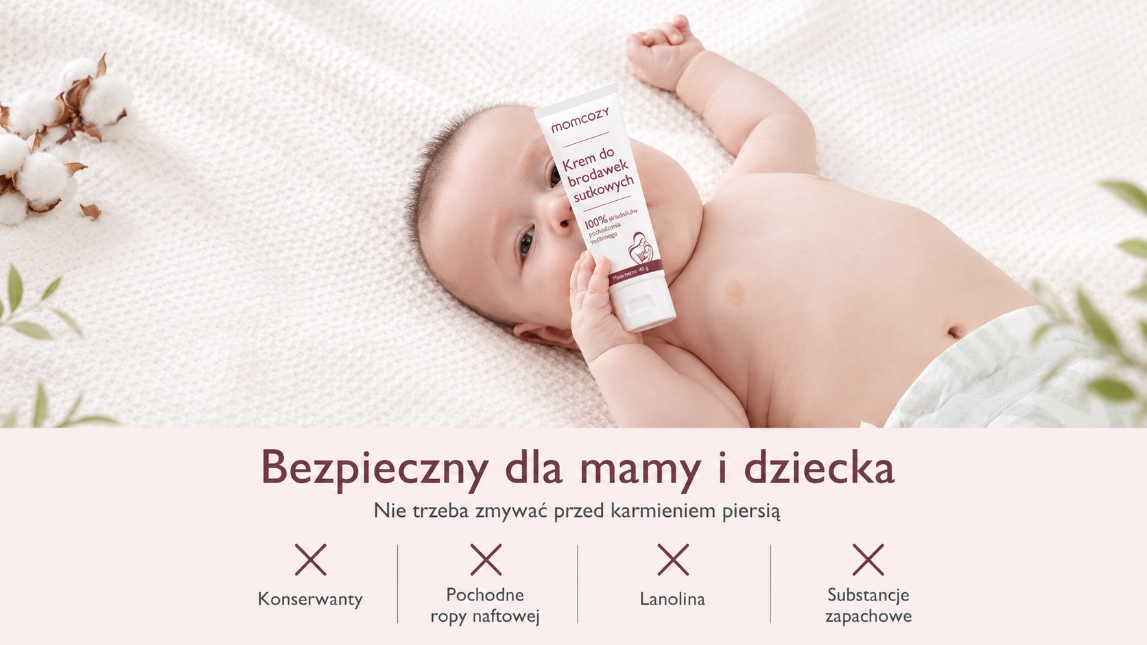 Un bebé sostiene un tubo de crema, información sobre la seguridad para madre y bebé, no es necesario retirarla antes de la toma