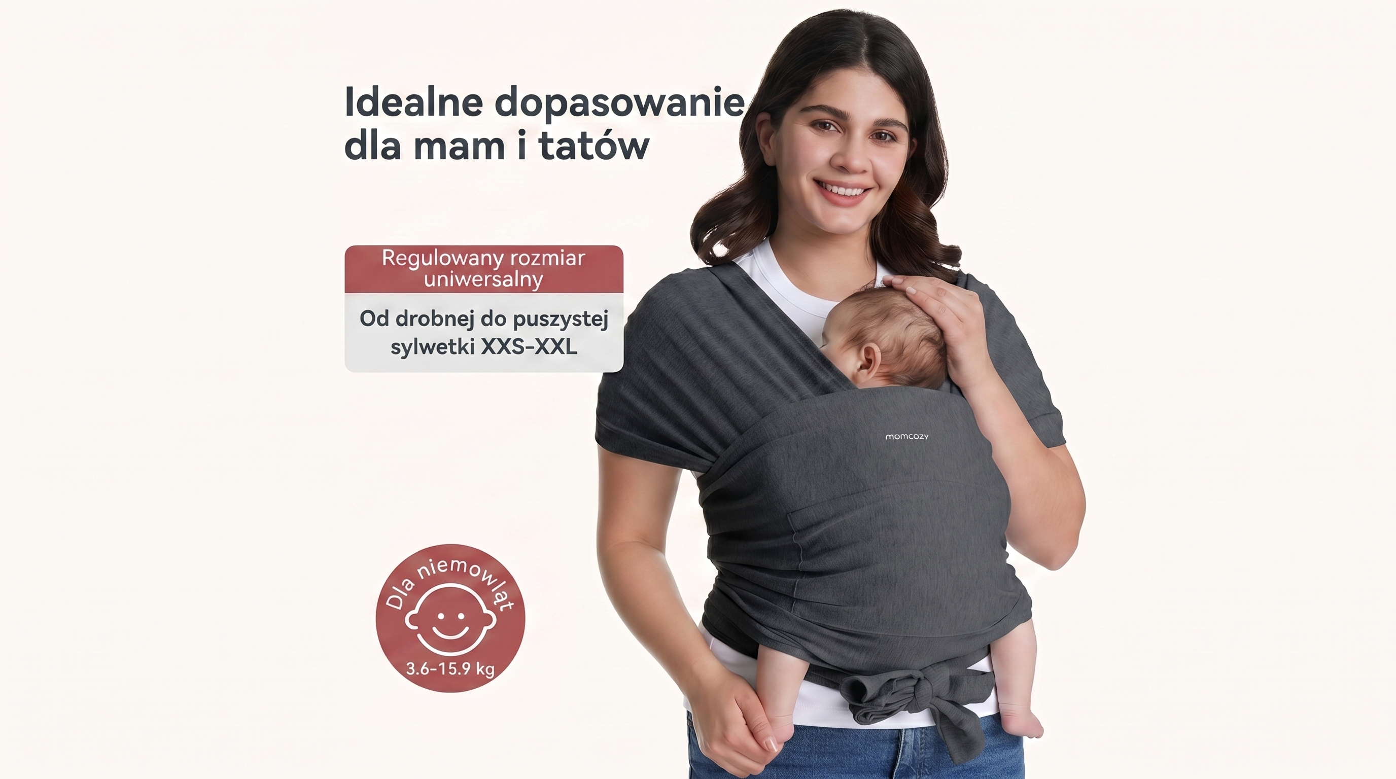 Tragetuch Momcozy M20SSCJ01 Baby Wrap Carrier Dark Grey. Eine Frau hält ein Baby in einem dunkelgrauen elastischen Tuch.