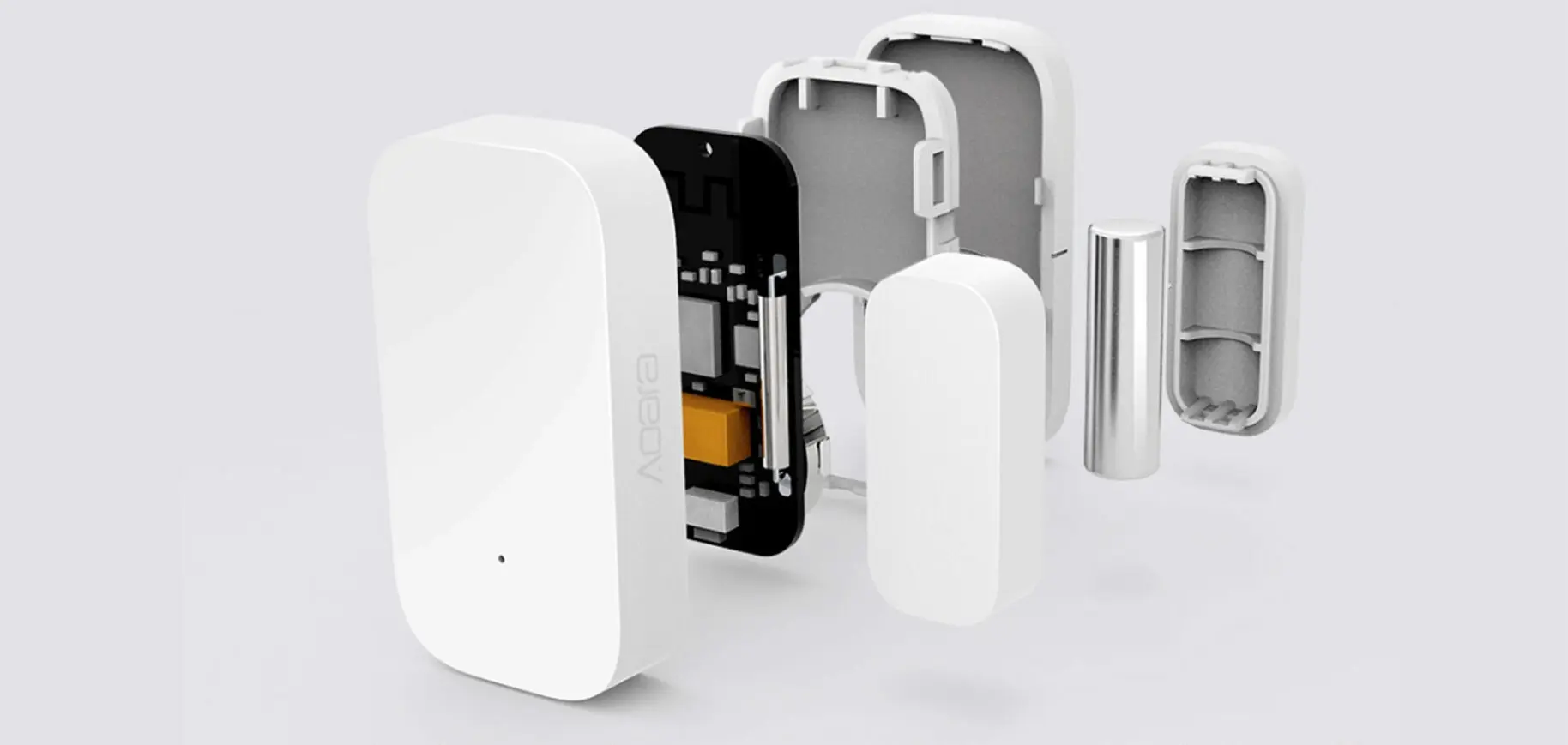 Rozmontowany czujnik Aqara, z widocznymi elementami wewnętrznymi i baterią