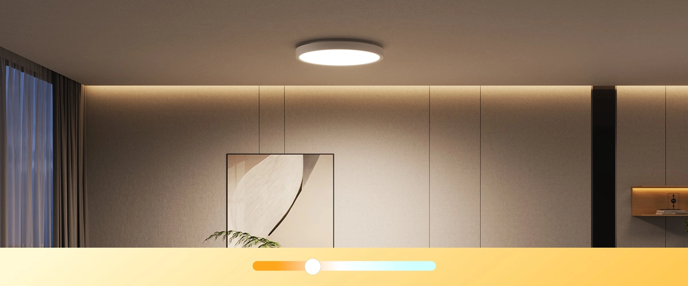 Okrągła lampa sufitowa LED Govee H80A1 świecąca ciepłym białym światłem, zamontowana w nowoczesnym salonie z jasnymi ścianami i zasłonami
