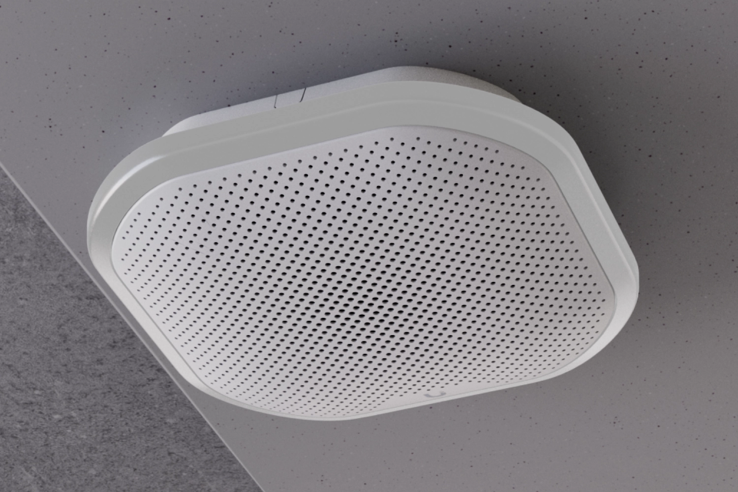 Ubiquiti UP-Siren PoE для потолочного монтажа в виде белого перфорированного блока с закругленными краями