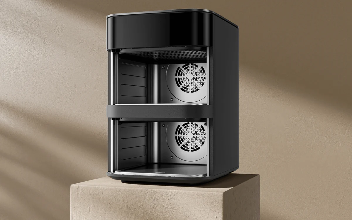 Interior of an empty Xiaomi air fryer with visible two heating levels and air circulation system fans