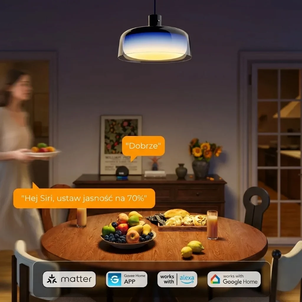 H60C1 lamp with a blue accent above a round dining table with fruit in a modern flat