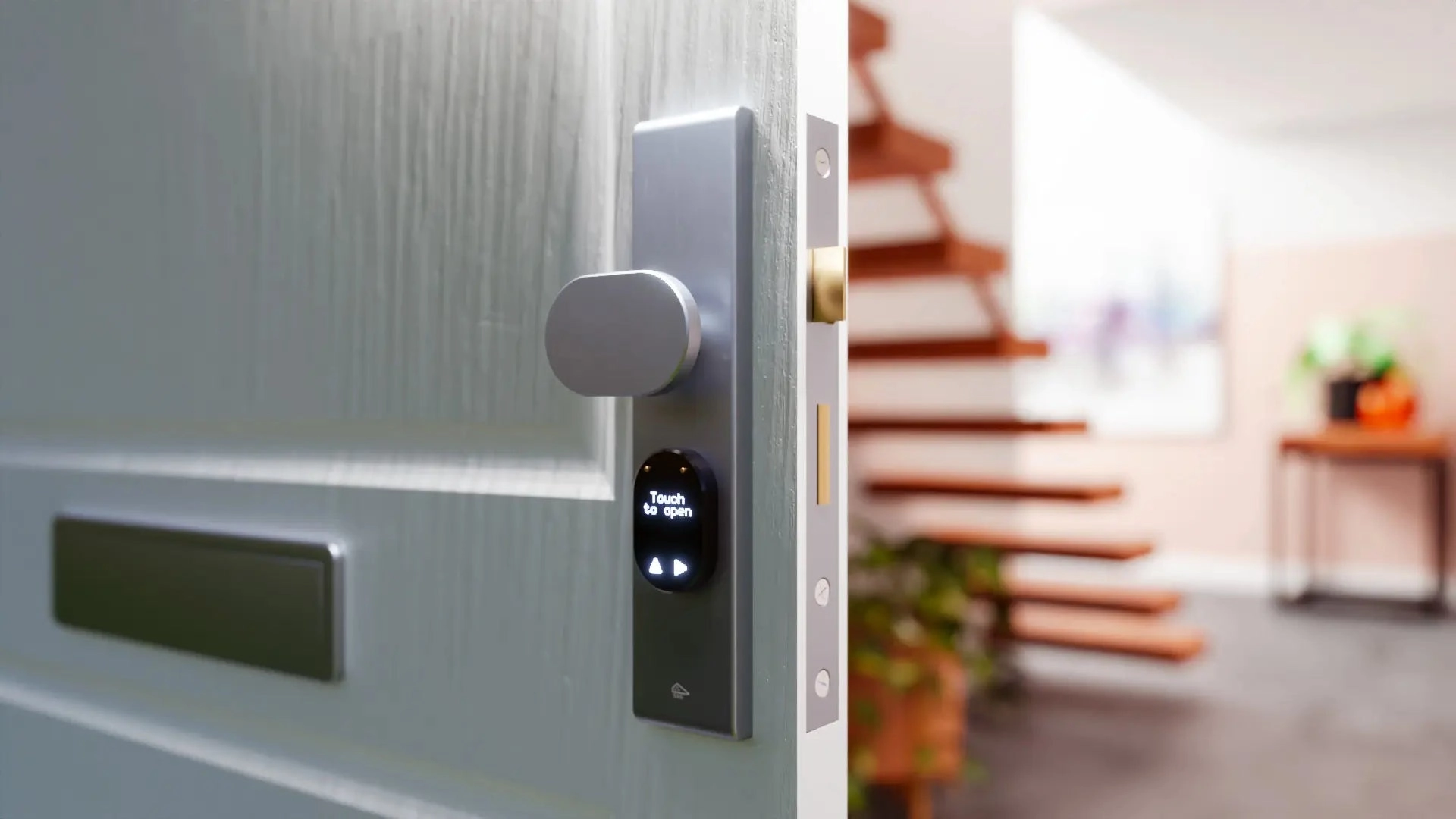 Zamek elektroniczny na drzwiach z widoczną opcją „Touch to open” do otwierania za pomocą dotyku