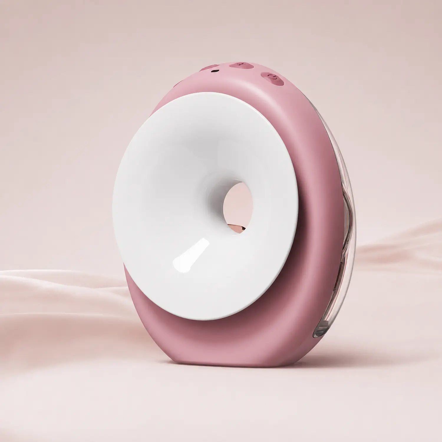 Молокоотсос Momcozy розовый с белым силиконовым воротником, установленный на нейтральном фоне, с видимыми кнопками управления