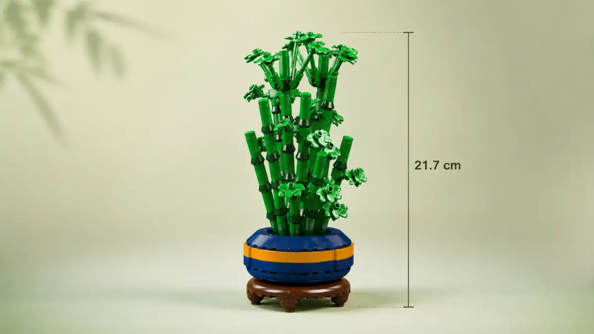 Modelo de bambu de blocos sobre fundo claro com uma linha vertical a indicar a sua altura.