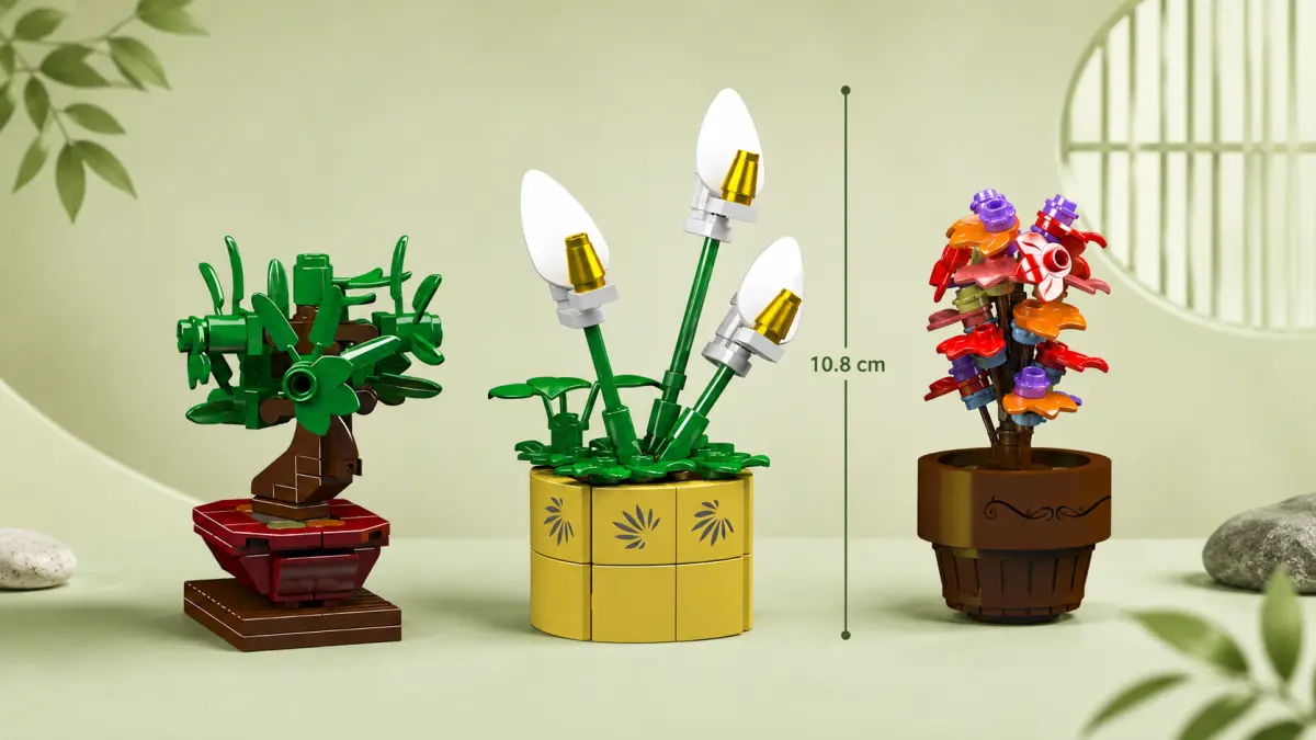 Tr&ecirc;s modelos de plantas de blocos colocados lado a lado sobre um fundo verde-claro.