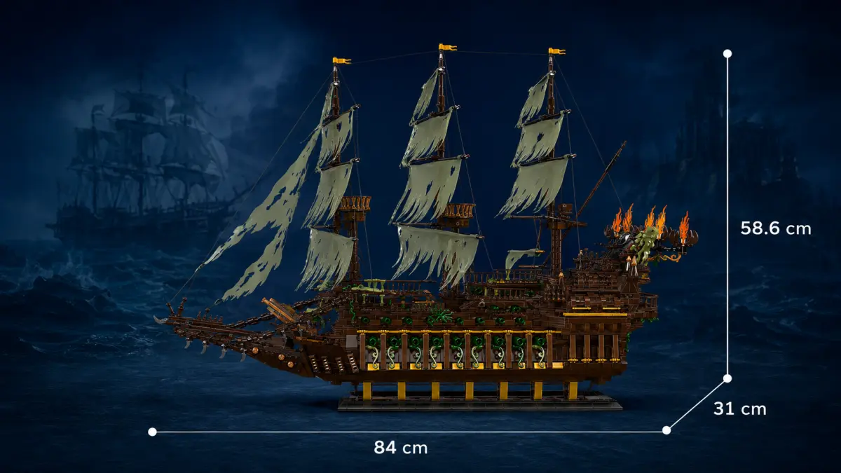 Modelo de navio fantasma de blocos mostrado de perfil num suporte, sobre um fundo de mar noturno.