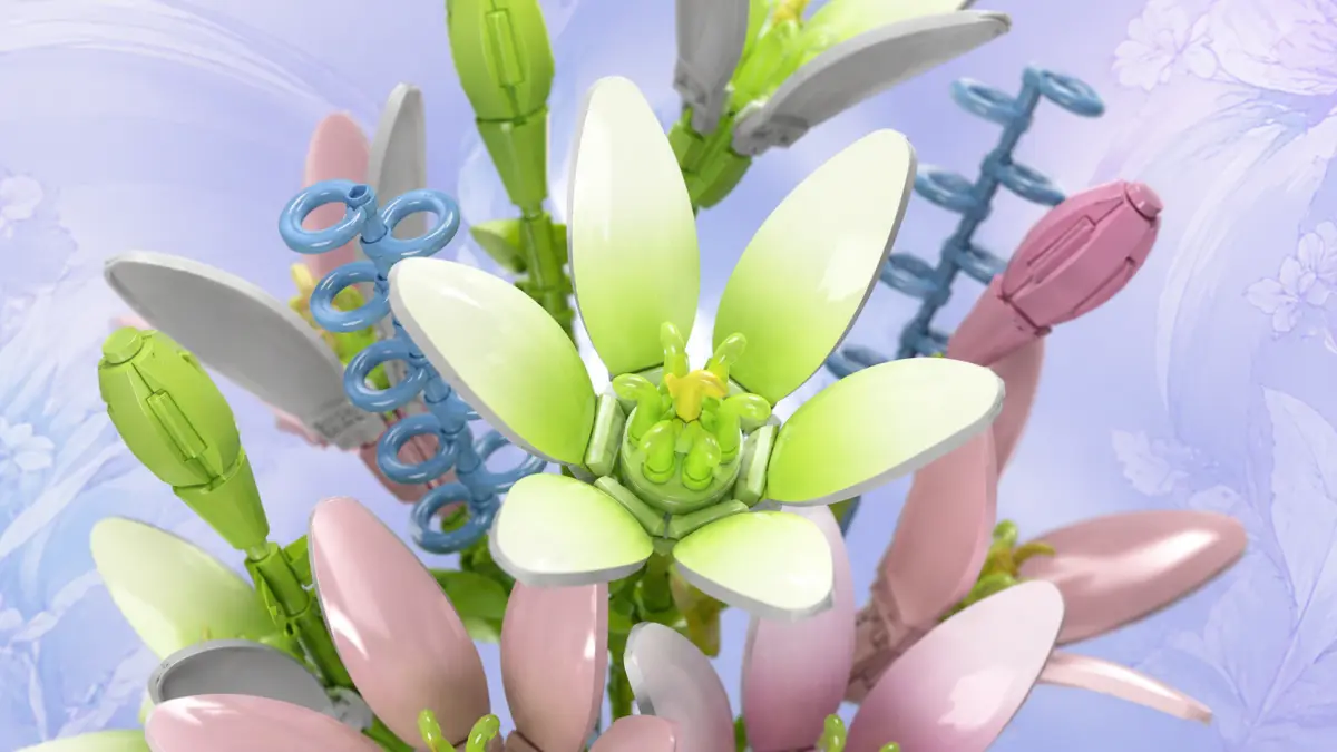 Primo piano di un fiore bianco e verde in mattoncini in un bouquet pastello