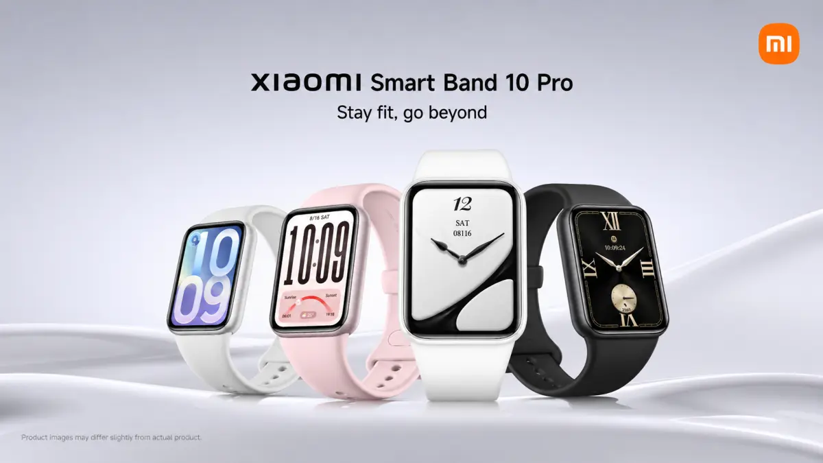 Quatro smartwatches com pulseiras brancas, cor-de-rosa e pretas dispostos lado a lado.