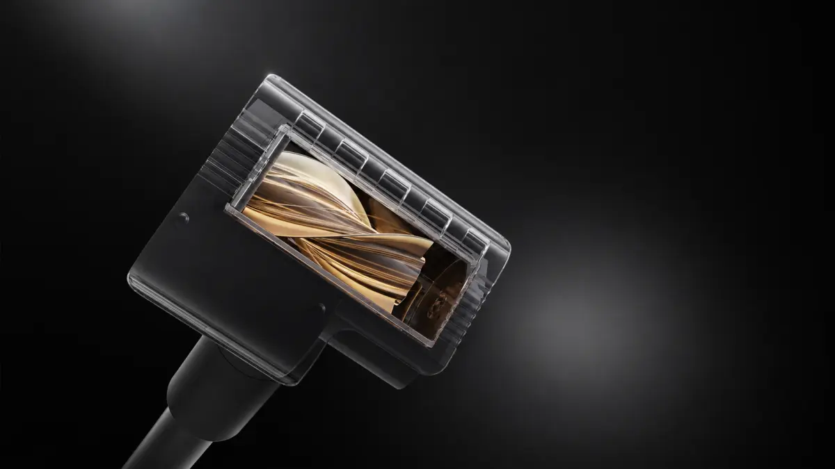 Końcówka szczotki odkurzacza Xiaomi z widocznym wałkiem czyszczącym na ciemnym tle